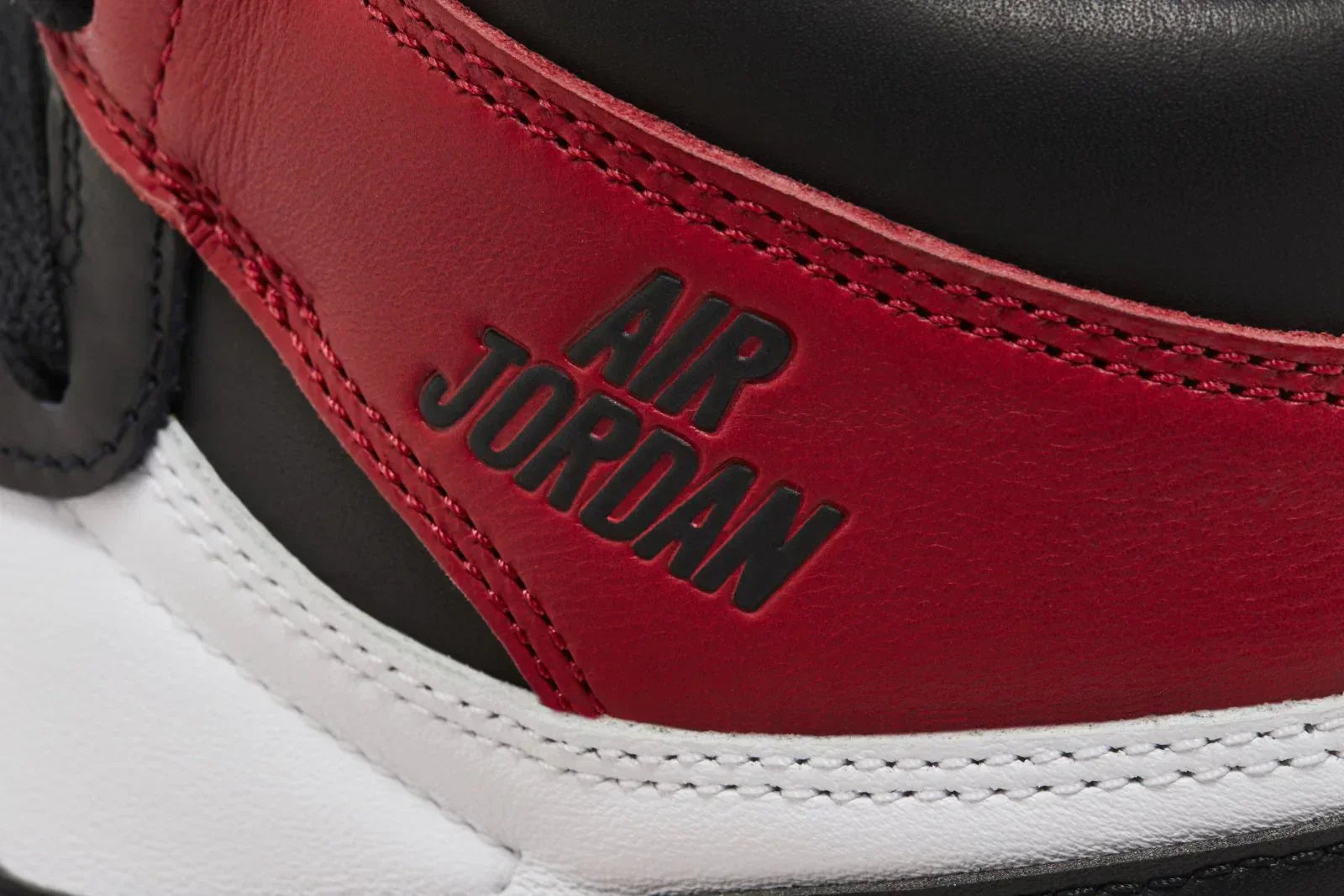 AJ 1 Retro High OG Black Toe Reimagined Red